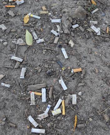 Smoke smoke smoke smoke that cigarette! Under the cleanup, more trash.