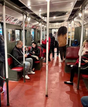 <b>It may be the 2023 Holiday Season, but if you check this subway car’s fixtures, it could be 1977. If you close your eyes and listen to the train speed along between stations, it’s the 1930s. </b>Photo: Ralph Spielman