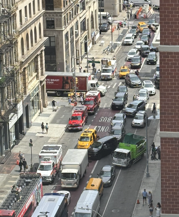 Firetrucks and police cars lined the street at approximately 10 a.m. after the fire was called in.