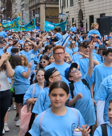 Youthful celebrants on Fifth Avenue.