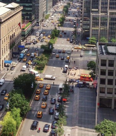 Park Avenue as it currently stands, with the green median and planters that gave the corridor its name in 1888.