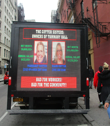 Scabby the blow up rat that union workers had employed during pickets at Tammany Hall as it built the new PETCO regional HQ at Tammany Hall were replaced by trucks with ads on its panelts