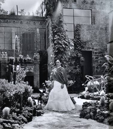 Gis&#xe8;le Freund. &quot;Frida In Garden, Casa Azul,&quot; c. 1948. Courtesy of Throckmorton Fine Art