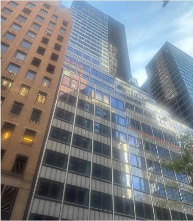 The E. 43rd St. rear of the former Pfizer HQ. The buckled beams of the building at 235 E. 42nd St. were in the northwest corner of the building, which caused nearby buildings to be vacated and roads closed until July 24. The cause of the near catastrophe remains under investigation.