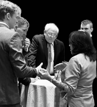 Keith J. Kelly was joined at the Deadline Club Hall of Fame induction by his three sons—(from left) Eamon, Ruairí, and Luke—who were there when NYU journalism professor Jessica Seigel stopped by to say hello during the cocktail hour. Former <i>NY Post</i> CEO Jesse Angelo said of Kelly’s three sons: “Keith is more proud of them than any scoop he got in the newspaper.”