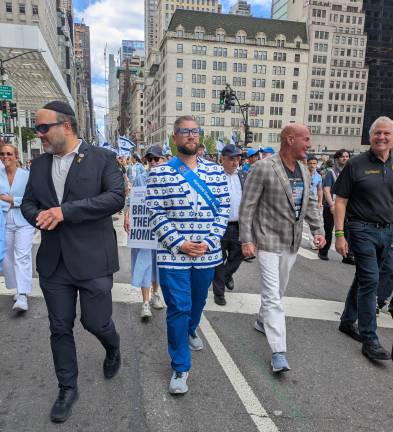 Israeli flag-jacket man and WABC radio host Sid Rosenberg.