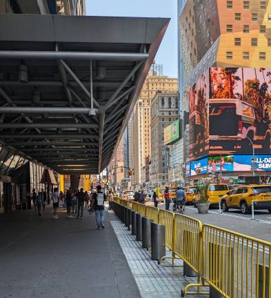 The canopy of Port Authority Bus Terminal looking north up Eighth Avenue.