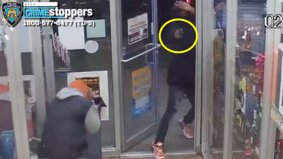 Convicted killer Camby Wilson with gun at East Harlem liquor store on February 25, 2022.