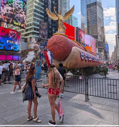 It’s a Hot Dog! It’s Art! It’s on display in Duffy Square through August 8.