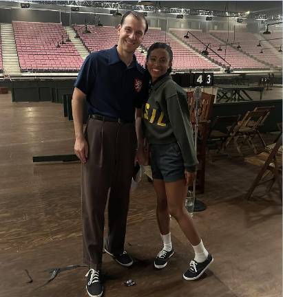 Timo Boll and Yasiris Ortiz on the set of “Marty Supreme.”
