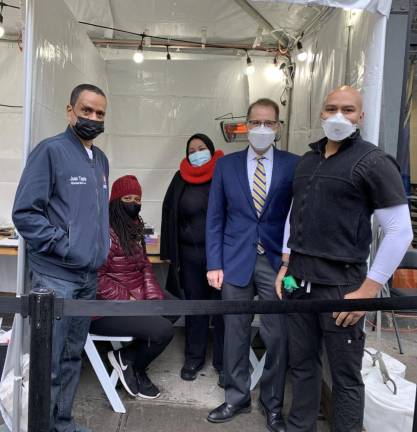 Manhattan Borough President Mark Levine (second from right) at a COVID testing site set up in partnership with SOMOS Community Care at his Northern Manhattan office on 125th Street. Photo: Mark Levine on Twitter
