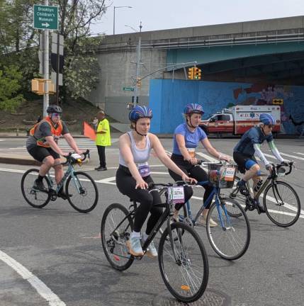 Bicyclists enjoy Brooklyn during the 5 Boro Bike Tour.