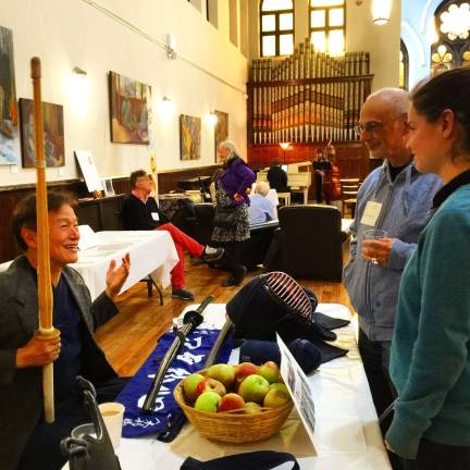 Kataoka Sensei of Kendo NYC, left, with Gerard Shaw and Brittany Sova on Sunday at the open house held at Jan Hus Presbyterian Church &amp; Neighborhood House on East 74th Street. In the far background, Travis Sullivan plays piano and Kyle Kaminski plays the acoustic bass. Photo: Jordan Tarwater