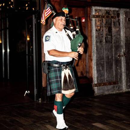 Aaron Clark as an FDNY Emerald Society piper.