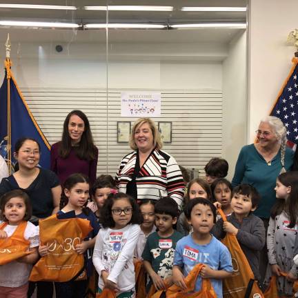 Upper East Side state Assembly Member Rebecca Seawright (back row center) poses with visiting students from P.S. 290 at her community office on York Avenue. Photo courtesy of Rebecca Seawright&#x2019;s office