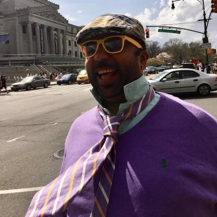 Dallas Penn on Eastern Parkway, Brooklyn Museum over his right shoulder.