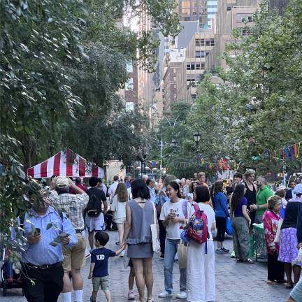 The annual National Night Out event for the NYPD’s 17th Precinct was held at Dag Hammarskjöld Plaza on August 4, drawing a crowd of local residents looking for grilled food and company.