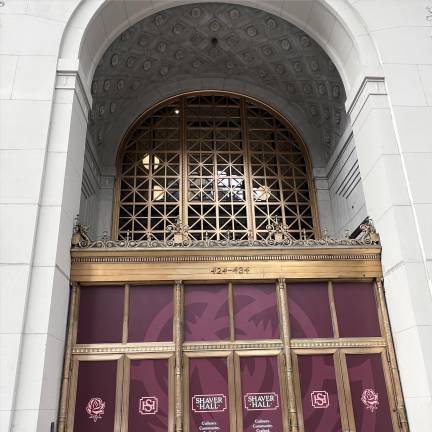 A public food hall is slated to open at the building in the coming months.