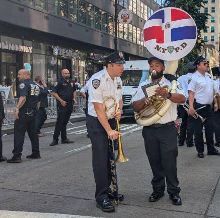 NYPD marching band warming up.