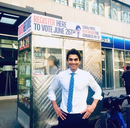 Suraj Patel at a food cart with his "New Blood" slogan. Photo: Courtesy of Suraj Patel campaign