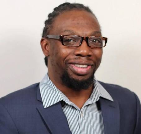 Marquis Jenkins grew up in NYCHA housing and has been a community activist for affordable housing.