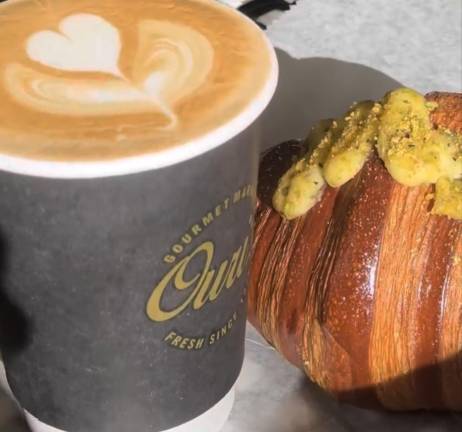 A latte and croissant at Ouri’s Market, 1160 Third Ave.