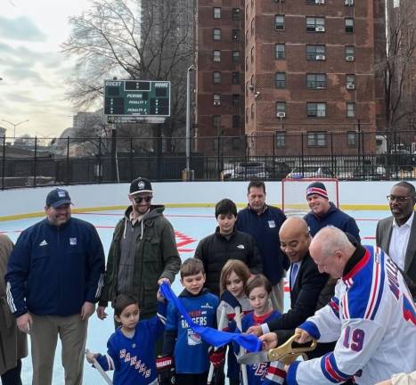 Brian Mullen and Eddie Gibbs cutting the inaugural ribbon with the Junior Rangers.