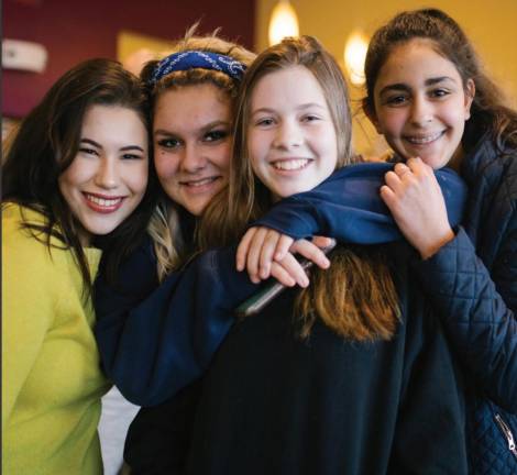 Homework Café is for homework, yes, but students also make friends and hang out there.