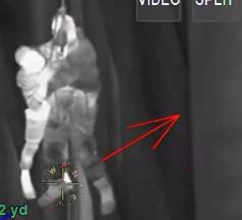 A firefighter captured on video brining one of the three people rescued from a window ledge of the burning building to safety. Photo: NYPD