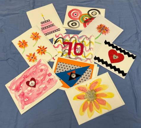 Hand-painted greeting cards by Eileen Millan. Photo: Robin Glasser Sacknoff
