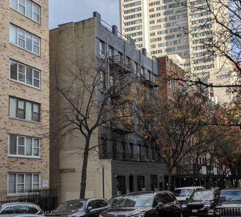 Yorkville apartment fire: 407 (left half of dark gray building) and 409 E. 81st St.