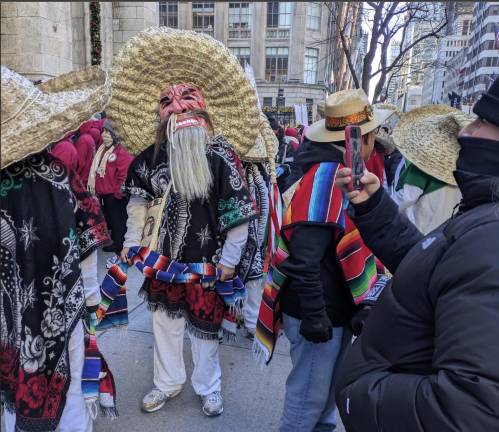 Costumed Mexican Dancers outside St. Patrick’s for Feast of Our Lady of Guadalupe.