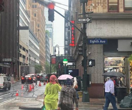 OK biker: A cyclist in a recently filed class-action lawsuit claims police are issuing summonses to bikers for red-light violations but are not aware that a traffic-rule change six years ago allows bikes to proceed through an intersection once the white pedestrian “walk” light is on, even if the traffic signal still shows red.