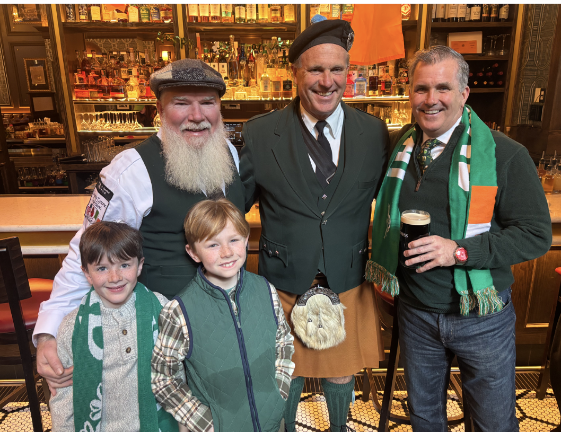 Family affair at Langan’s on W. 47th St. Back row: Kevin Clarke, Sean Duffy and his brother John Duffy. Sean Kids in front row brothers Emmet (left) and Desmond Clarke.