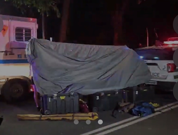 Police tossed a tarp over the area where Deniz died in Central Park on June 9.