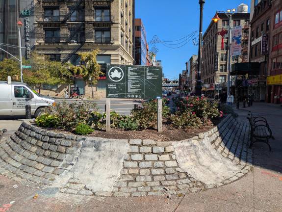 Kimlau Square, looking up East Broadway toward Manhattan Bridge, October 2025.