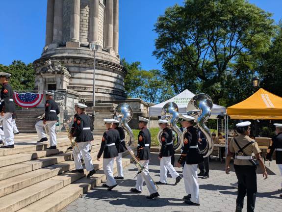 United States Marine Corps Band ascends the steps to the plaza in front of the Soldiers’ and Sailors’ Monument.