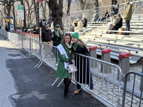 The cold weather meant the grandstand was a little sparse as the parade wore on, but spirits were still high especially when this Rose of Tralee spotted a friend from home among the spectators.