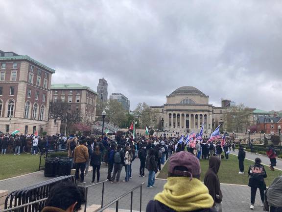 <i>Demonstrators gather at Columbia University during campus protests in April 2024. Mahmoud Khalil and members of Columbia’s SIPA Palestine Working Group filed a federal lawsuit against the university on Sept. 14.</i>