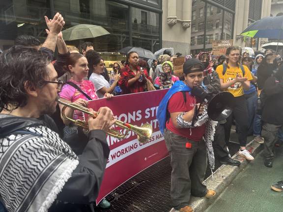 One idea behind the rally in NYC was to model it after a New Orleans-style funeral, complete with a marching band.