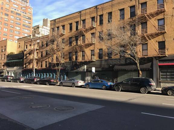 The east side of Third Avenue between 76th and 77th Streets in a recent photo. Lenox Hill Hospital controls the entire blockfront and plans a big medical facility on the site, but community leaders are demanding more details. Photo: Douglas Feiden