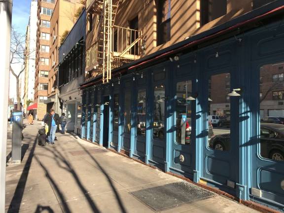 The site of the shuttered Atlantic Grill on the east side of Third Avenue between 76th and 77th Streets in a recent photo. Lenox Hill Hospital controls the whole block, but community frustrations are running high over exactly what will replace the restaurant. Photo: Douglas Feiden