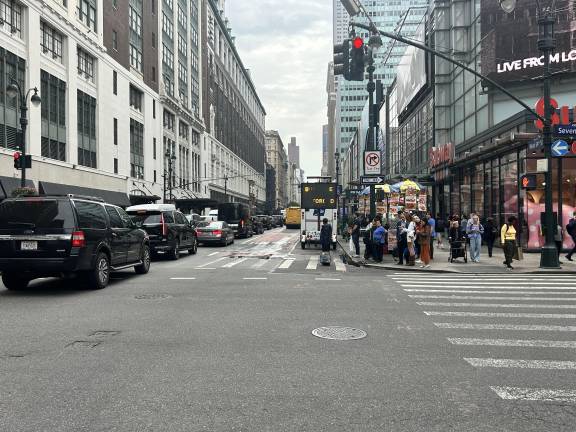 A view of West 34th Street near 7th Avenue where police were stepping up their presence. A sign that was supposed to warn drivers “bus lanes strictly enforced” was on the fritz when Straus News visited a few days after a deadly crash that killed a woman delivery driver on Sept. 28.