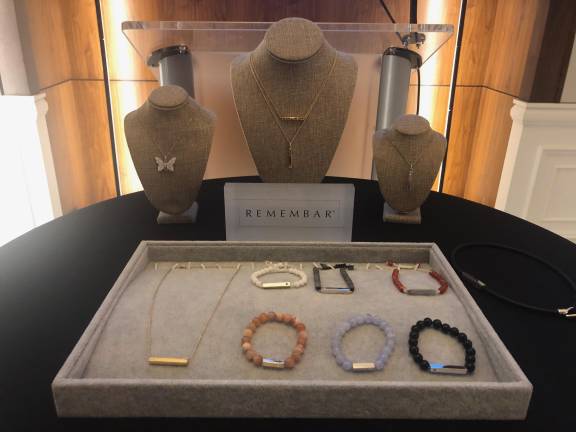 RememBar is a collection of fine memorial jewelry. Each piece is a hollowed-out vessel, with keepsakes securely held inside.