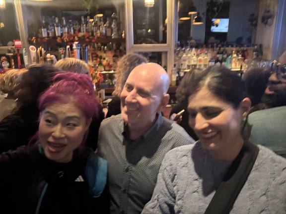 Harvey Epstein (center) shortly after he was the projected winner of the CD2 race, with supporters at Linen Hall in the East Village on Election Night, Nov. 4. He pulled in nearly 80 percent of the vote.