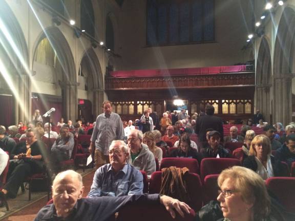 The crowd filing in for the community meeting on the American Museum of Natural History's expansion plans. Photo by Gabrielle Alfiero
