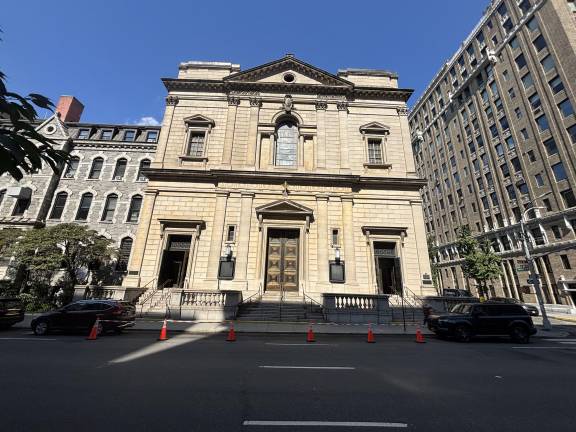 Orange traffic cones block cars from parking directly in front of St. Ignatius Loyola Church, which has an affiliated Catholic elementary school and a separate high school nearby. There was no visible NYPD presence when Our Town visited on Sept. 4.