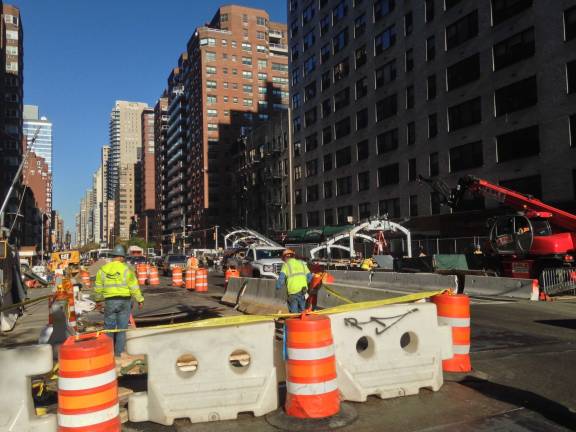 Contractors working Saturday to ready the Second Avenue subway line, near the 72nd Street station's entrance on 69th Street.