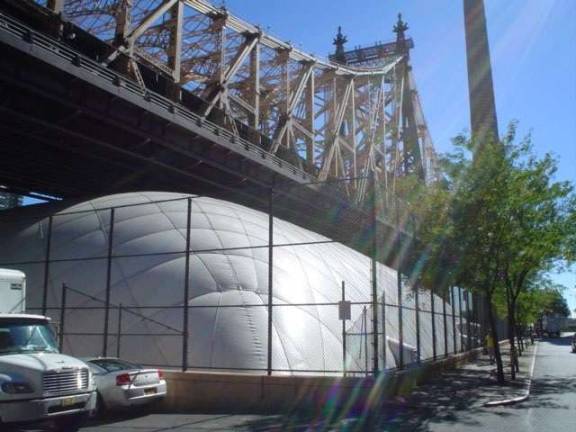 Under a concessionaire's agreement with the city's Parks &amp; Recreation Department, the private Sutton East Tennis Club operates 8 courts inside this bubble at the Queensboro Oval public park, between 59th Street and 60th Street. Photo: New York City Department of Parks &amp; Recreation