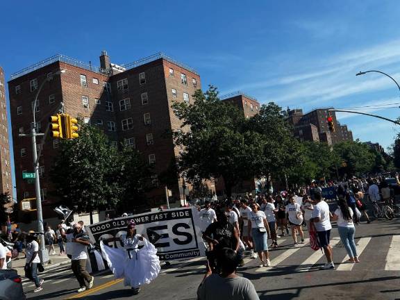 Marchers head up Ave D in the first ever LES Puerto Rican Day parade and festival on June 1. Photo: Stella Zhong